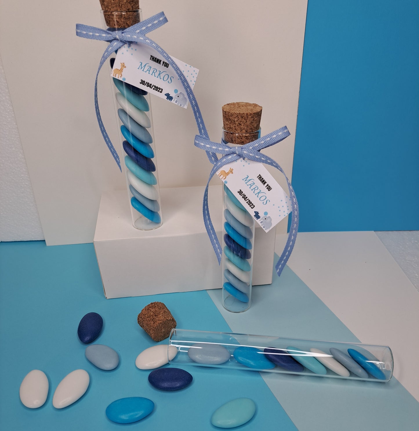 Glass tube with blue candy