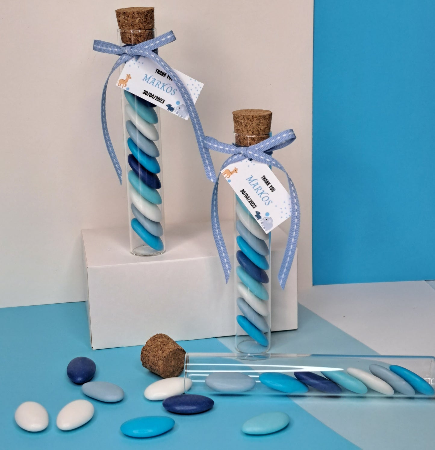 Glass tube with blue candy