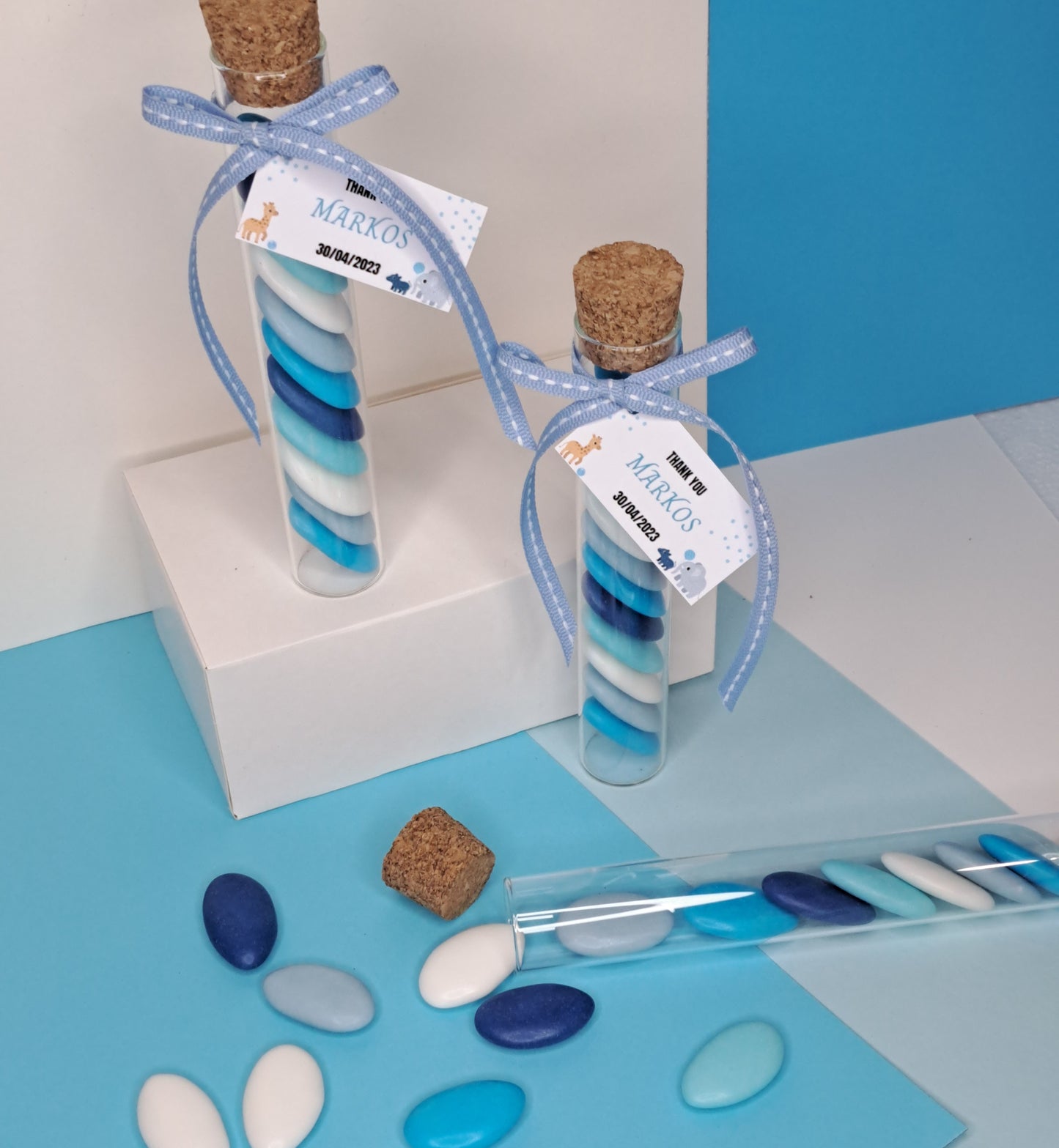 Glass tube with blue candy