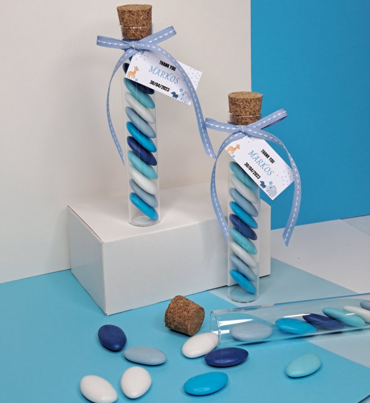 Glass tube with blue candy