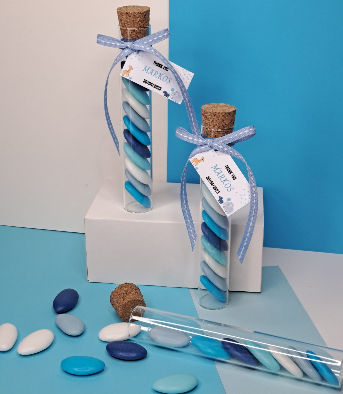 Glass tube with blue candy