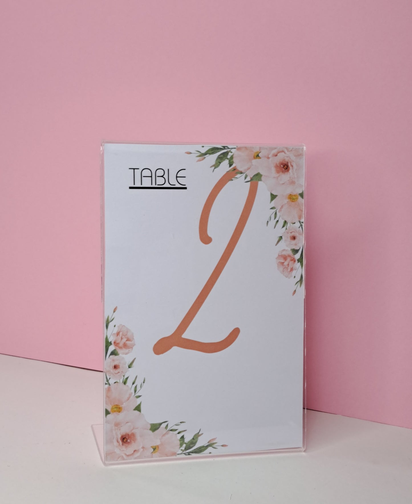 Table numbers in clear stand