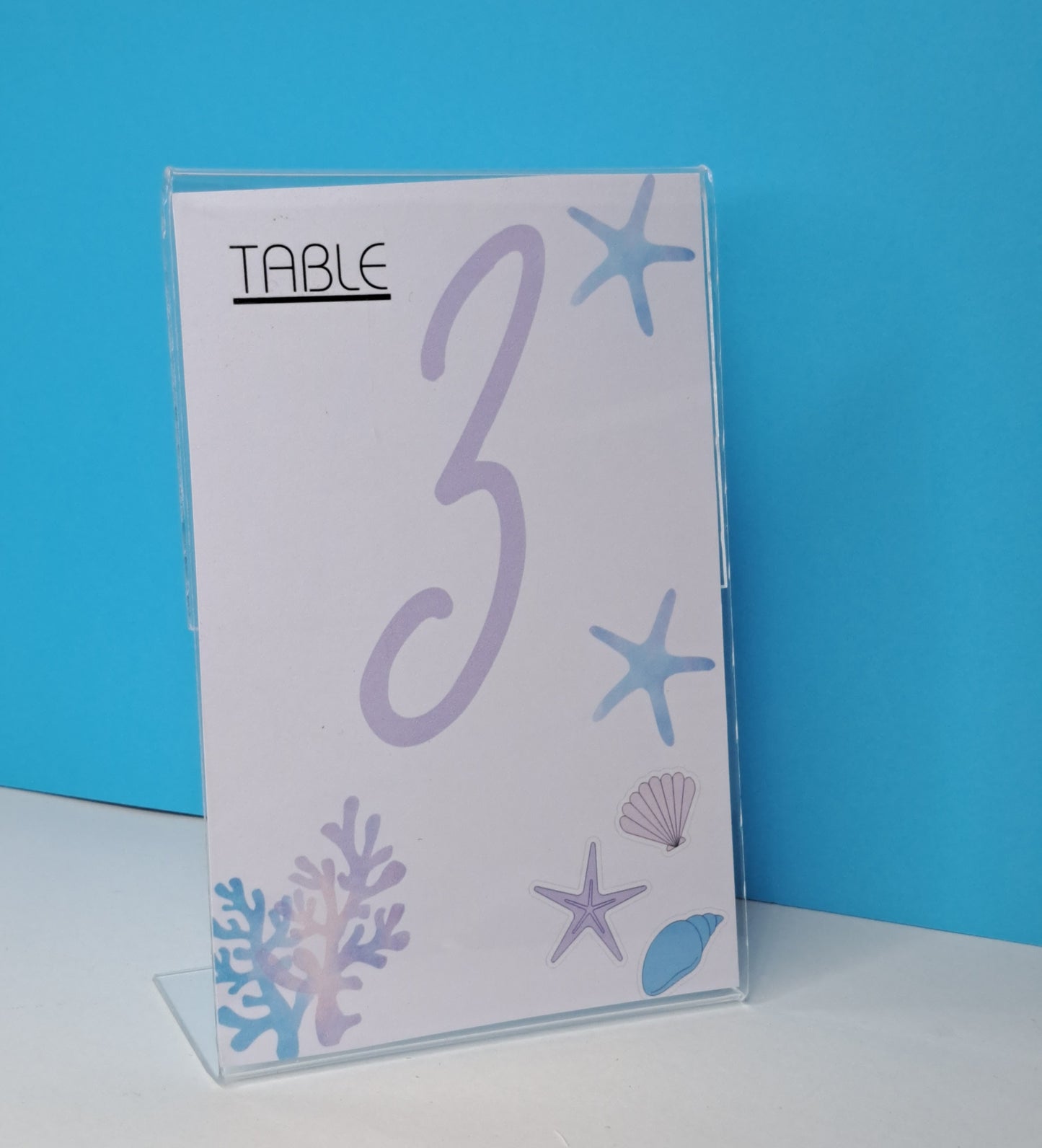 Table numbers in clear stand
