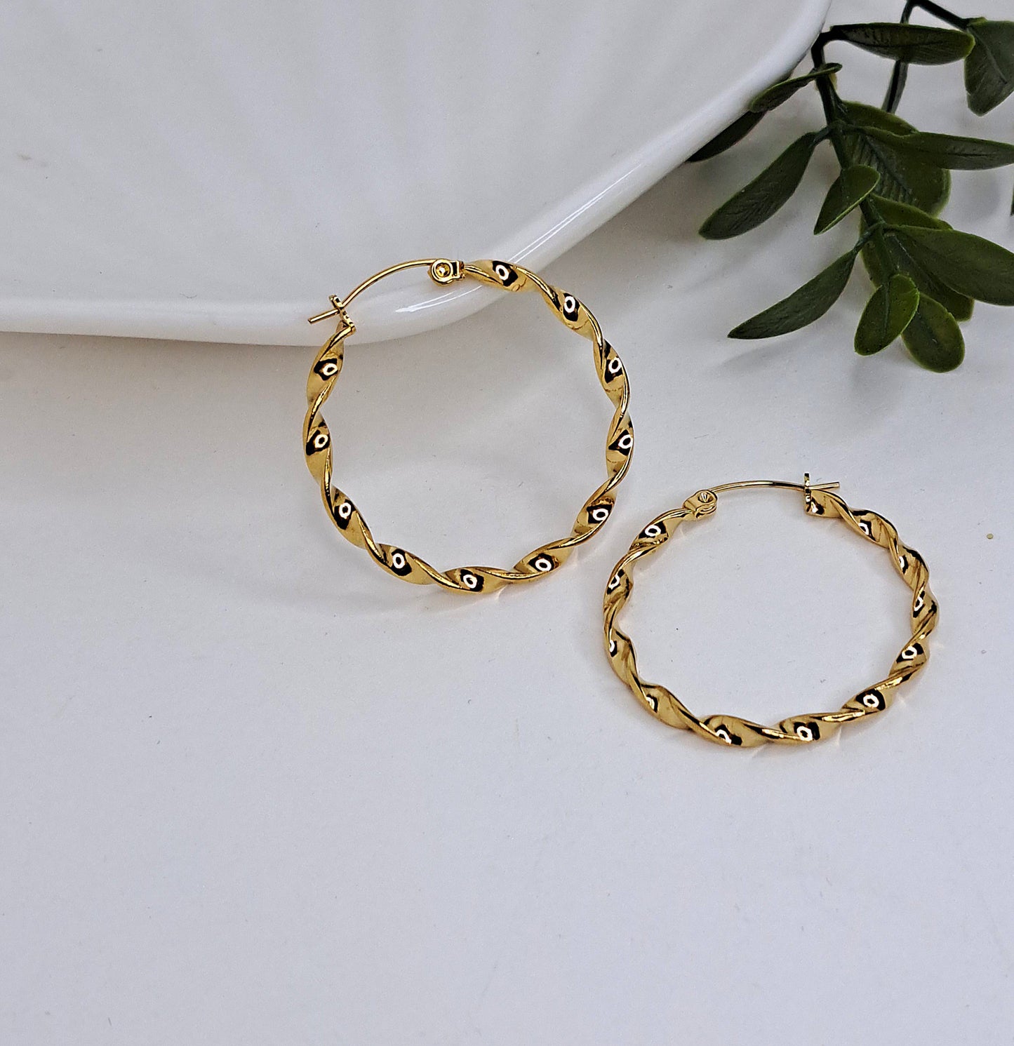Twisted gold hoop earrings