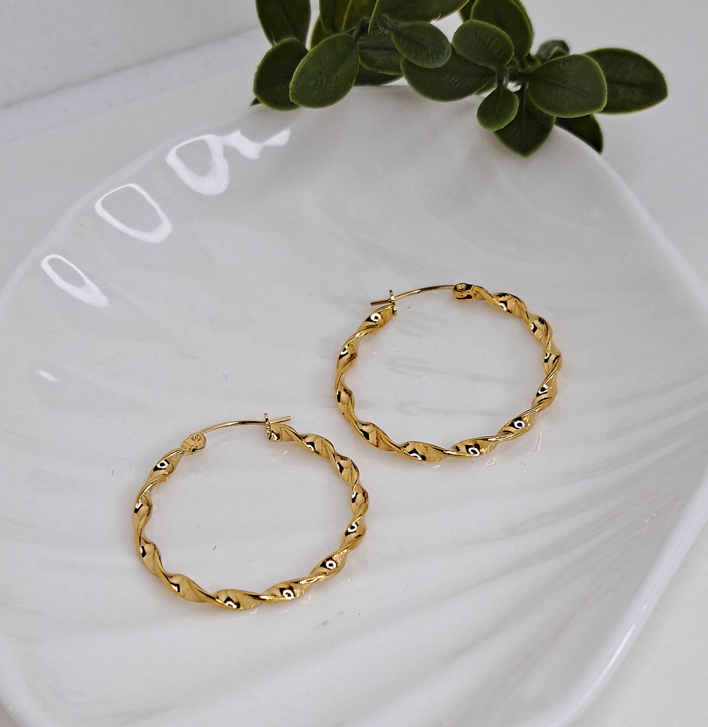 Twisted gold hoop earrings