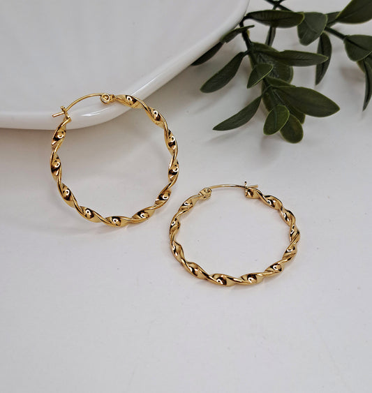 Twisted gold hoop earrings